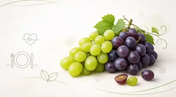 Zielone i fioletowe winogrona, symbolizujące zdrowy styl życia i niski indeks glikemiczny.